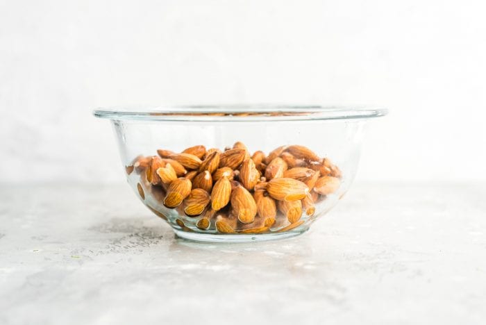 Drained and Rinsed Almonds in a Glass Bowl for Making Almond Milk