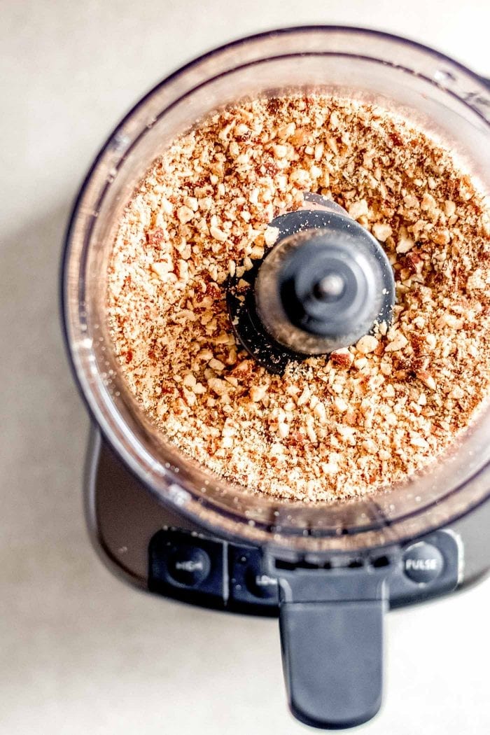 Almonds blended into a grainy flour in a food processor.