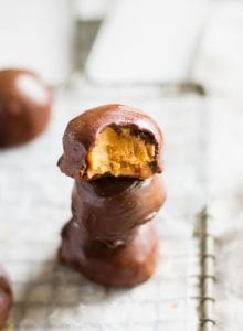 Vegan Chocolate Covered Peanut Butter Balls - Running on Real Food