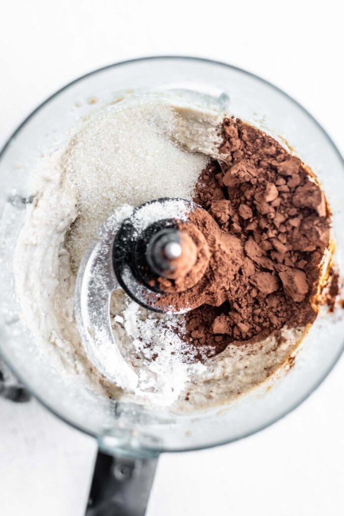 Sugar and cocoa powder in a food processor.
