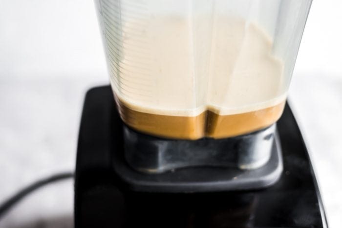 Close up of blended bulletproof coffee in a Vitamix.
