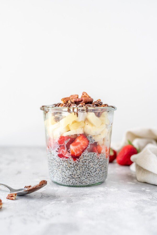 Vanilla chia seed pudding topped with fresh fruit and pecans.