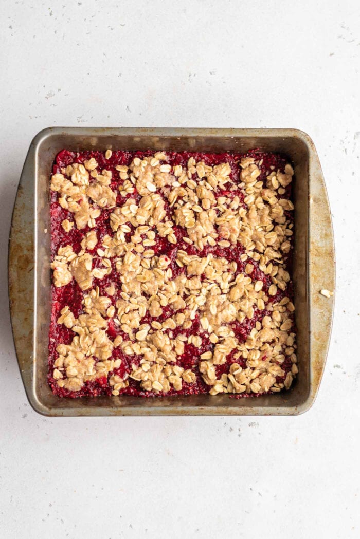 Baked oat crumble in a baking pan.