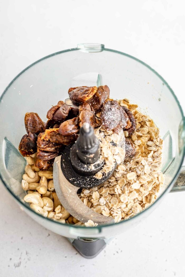 Cashews, oats and dates in a food processor.