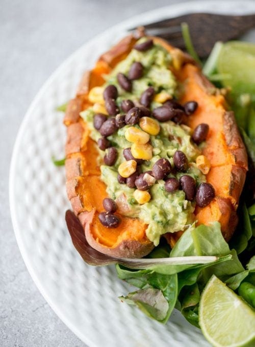 Guacamole Stuffed Sweet Potatoes with Beans - Running on Real Food