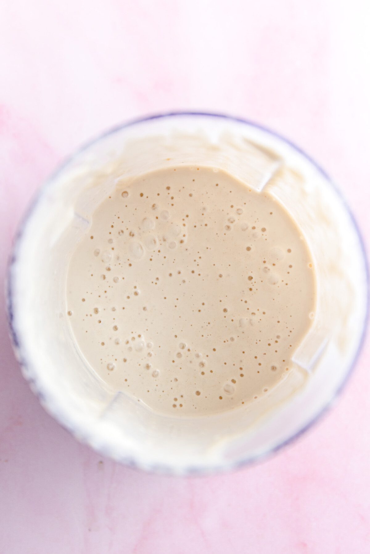 Creamy tahini sauce in a blender.