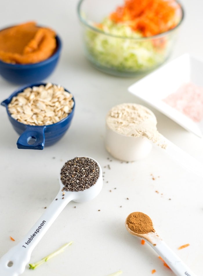 All of the ingredients needed for making oatmeal with pumpkin and chia seeds.