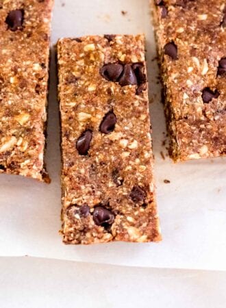 3 chocolate chip granola bars on a piece of parchment paper.