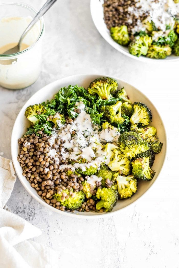 Easy tahini sauce on a bed of kale, broccoli and lentils.