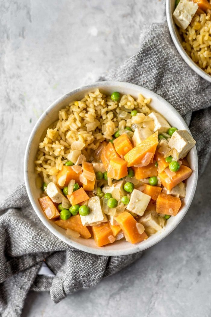 Small bowl of sweet potato curry with brown rice.