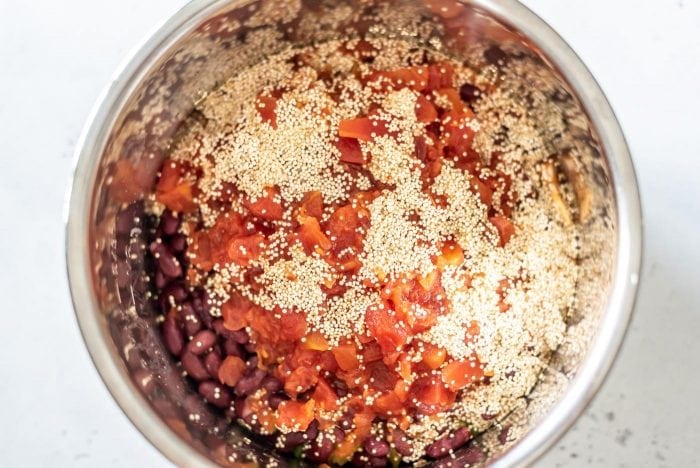 Quinoa, diced tomatoes and kidney beans in an Instant Pot.