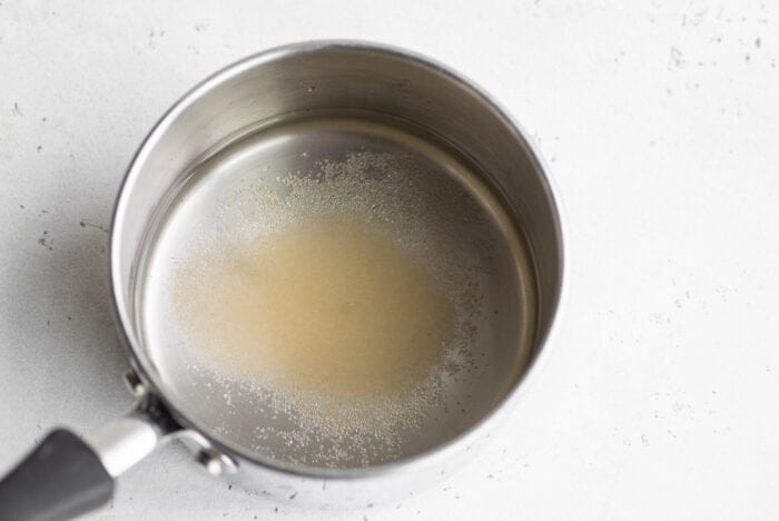Vinegar, water and sugar in a small saucepan.
