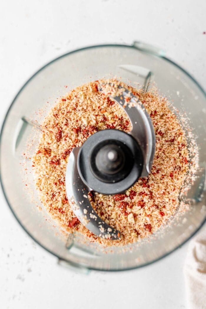 Blended coconut, goji berries and cashews in a food processor.