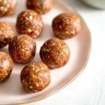 Close up of goji berry balls on a plate.
