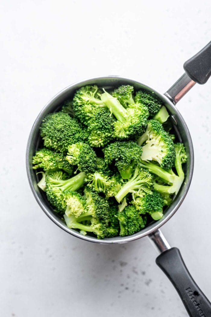 Steamed broccoli in a steaming pot.