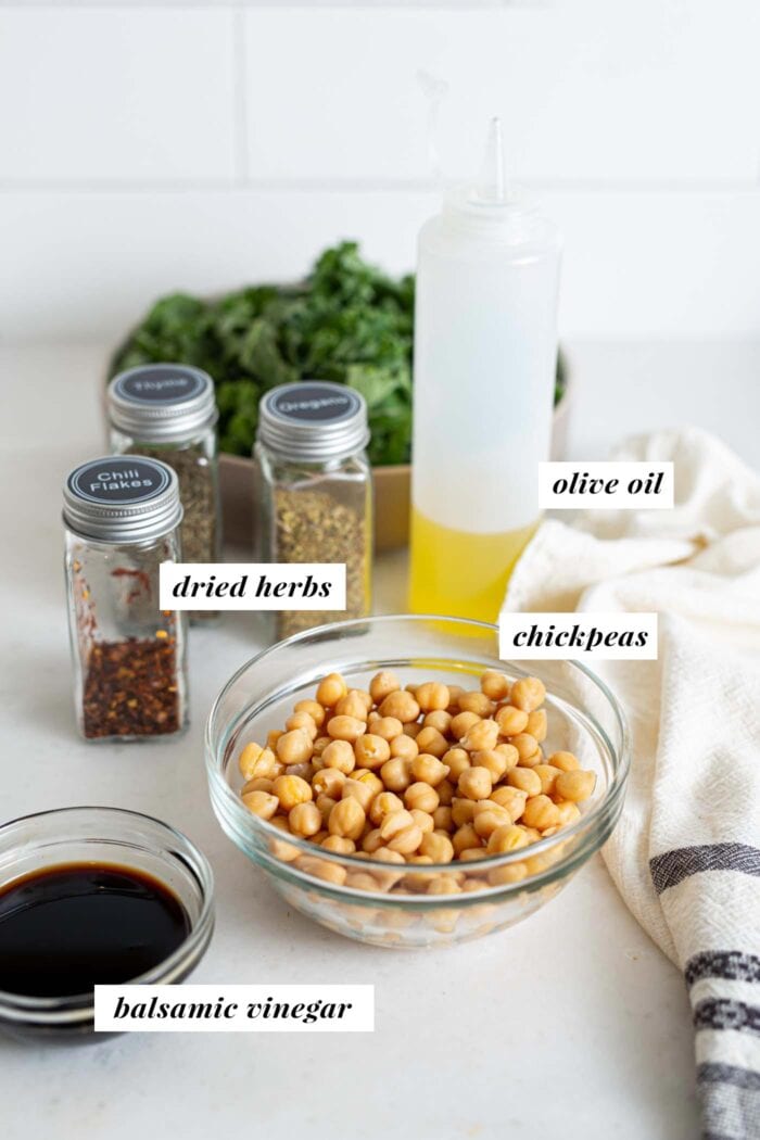 Chickpeas, containers of herbs, oil and balsa