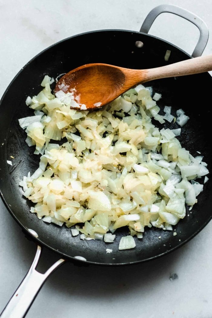 Sauteed onion and garlic in a skillet.