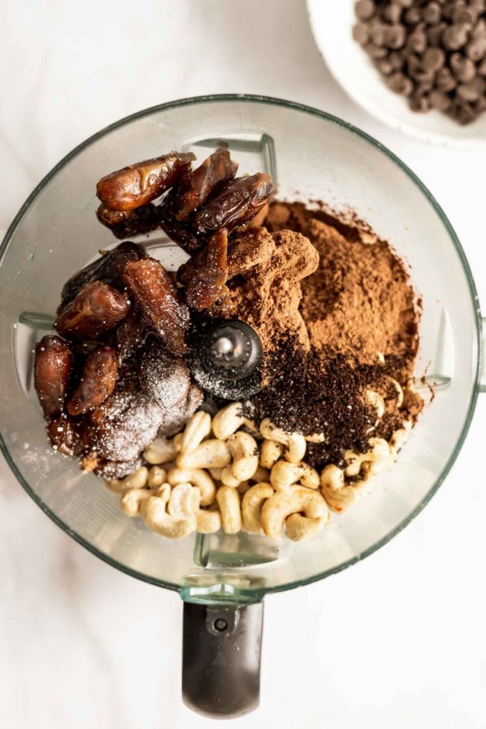 Dates, cashews, cocoa powder, coffee and sea salt in a food processor.