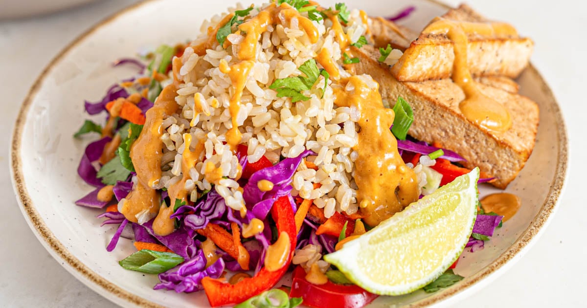 https://runningonrealfood.com/wp-content/uploads/2020/09/Vegan-Chopped-Thai-Salad-Tofu-Brown-Rice-Recipe-7.jpg