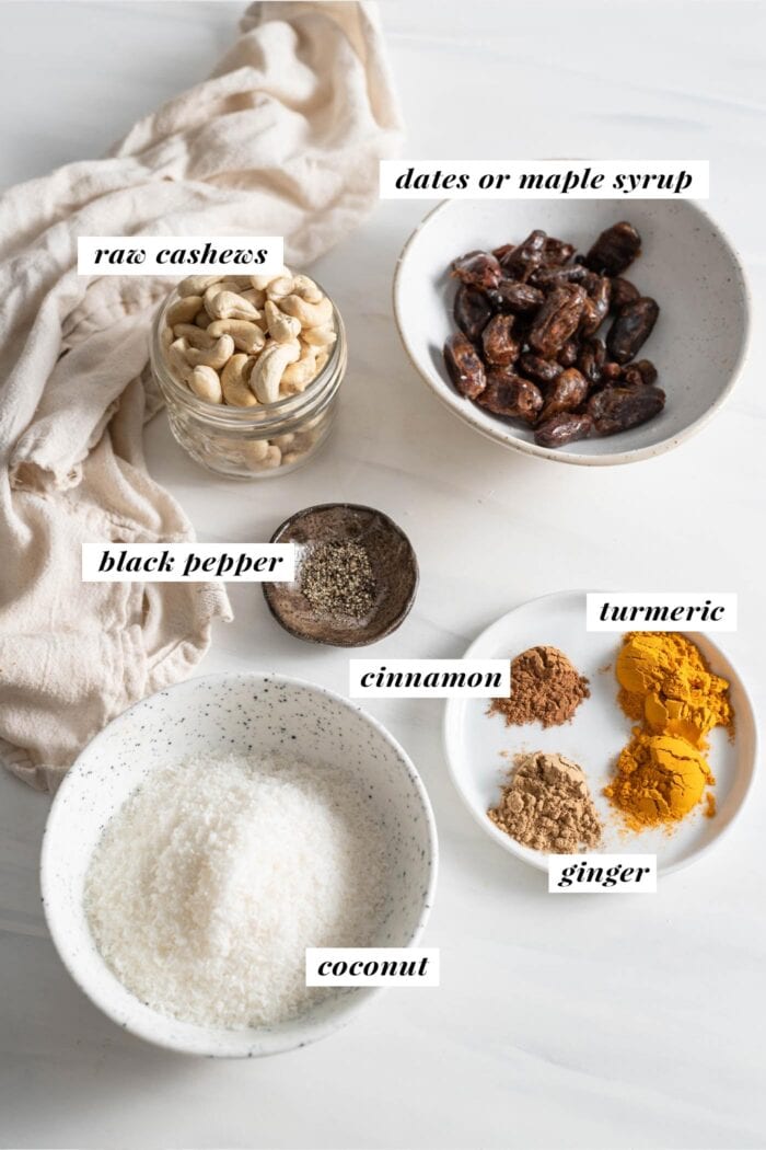 Coconut, dates, cashews and various spices labelled with text overall.