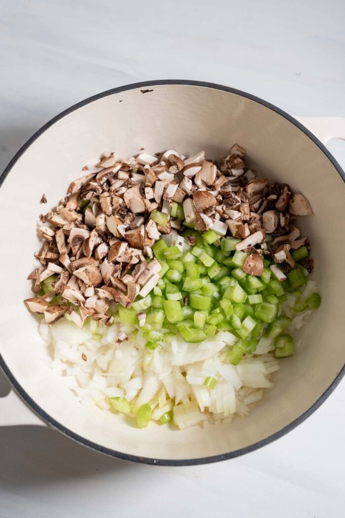 Chopped mushrooms, celery, onion and garlic in a large saucepan.