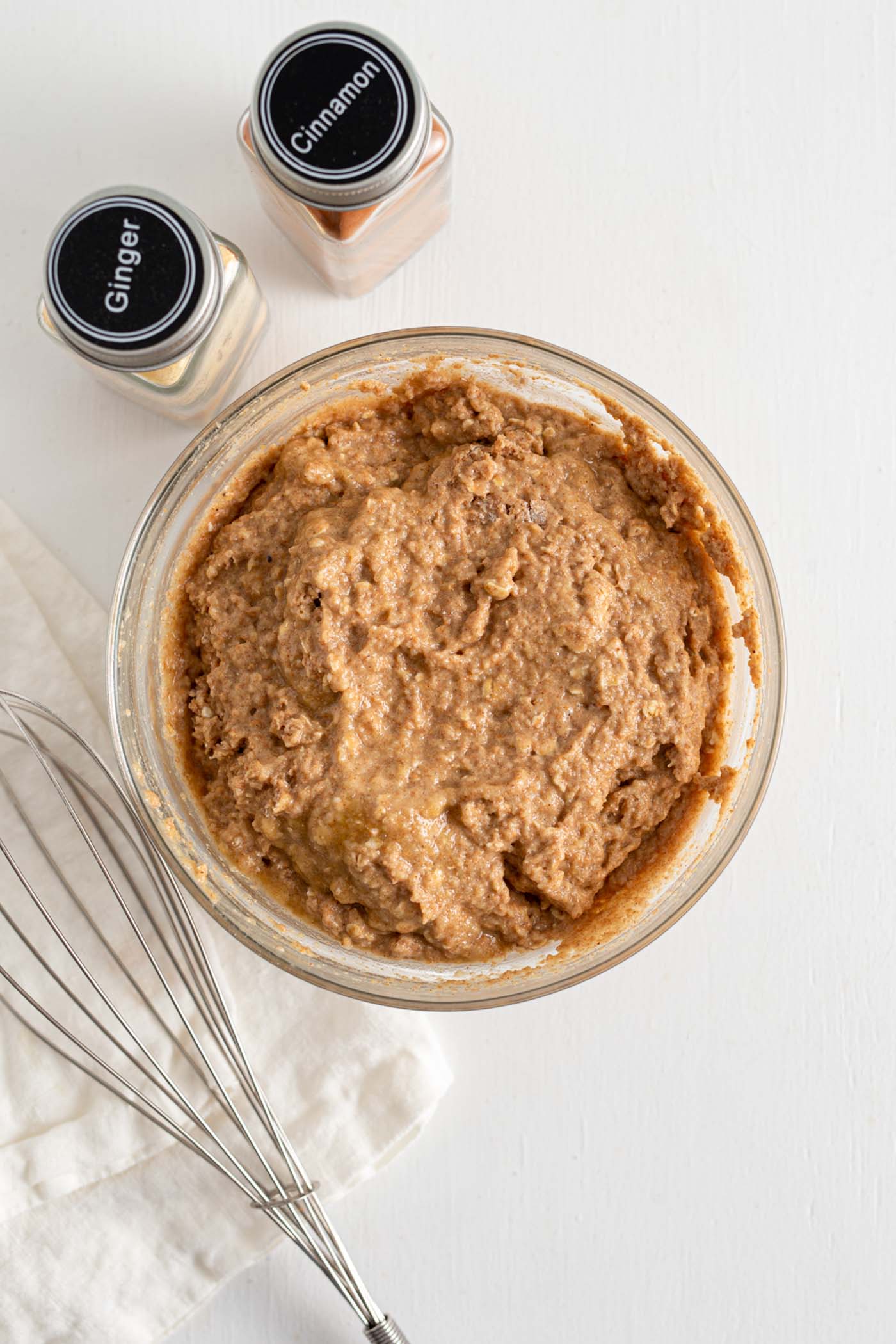 Raw muffin batter mixed together in a bowl.