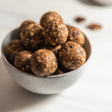 Raw banana bread balls in a bowl.