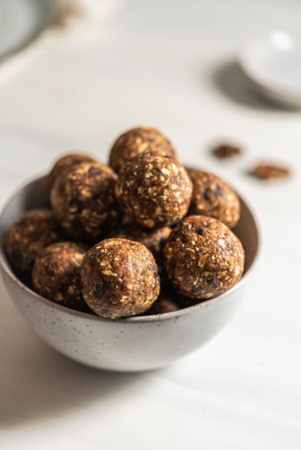 Raw banana bread balls in a bowl.