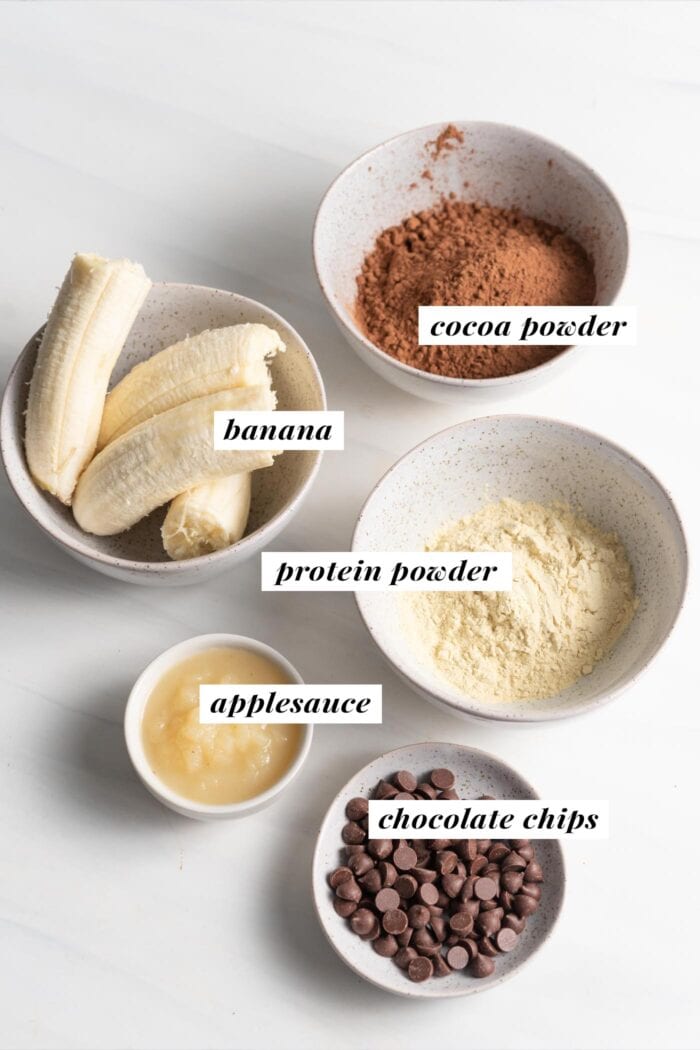 Visual list of ingredients for making chocolate chip protein brownies. Each ingredient is labelled with text.