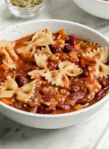 Bowl of minestrone soup with beans and pasta.