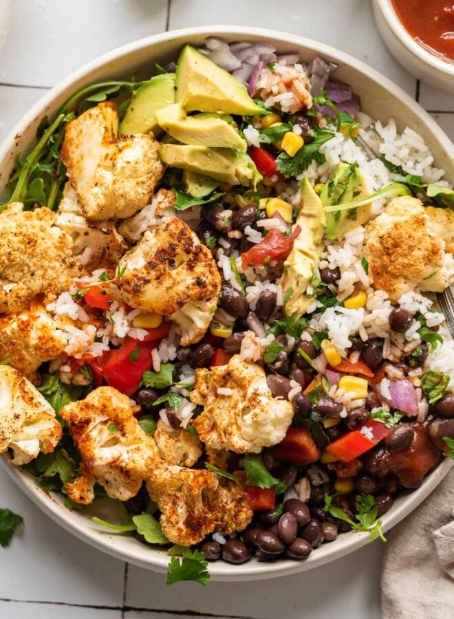 Roasted Cauliflower Burrito Bowls - Running On Real Food