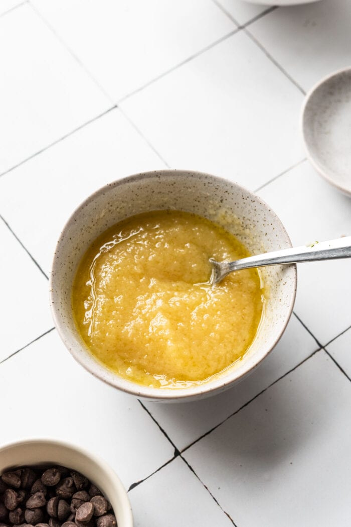 Applesauce and olive oil mixed together in a small dish.