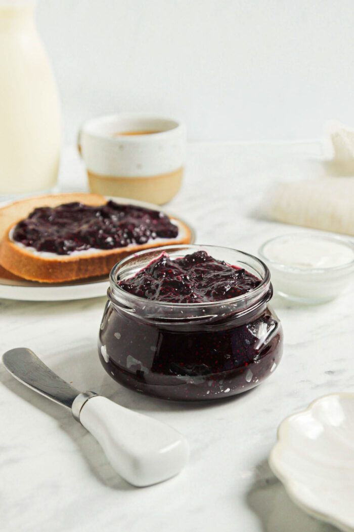 Small jar of blueberry chia seed jam.