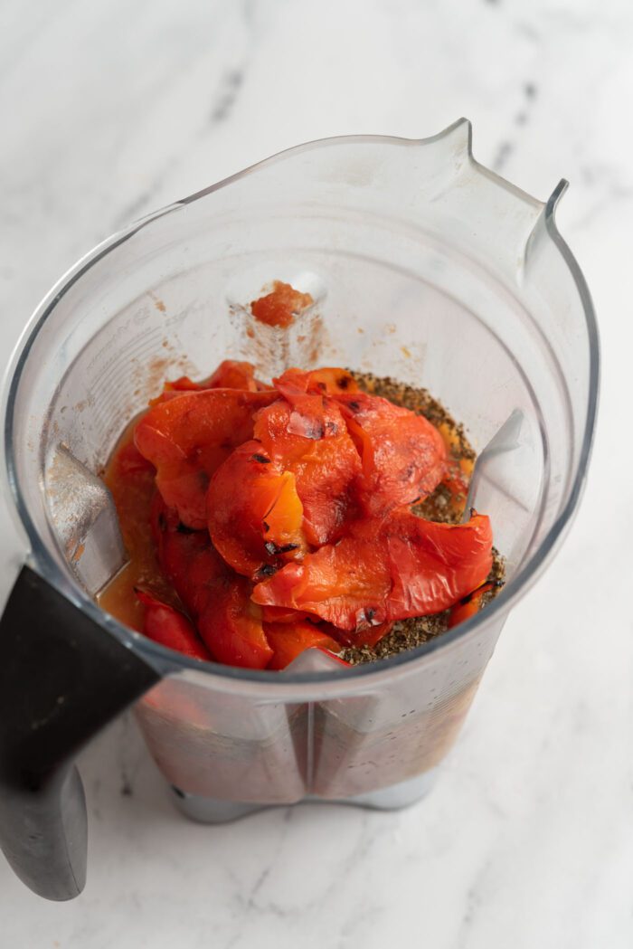 Roasted red peppers in a blender.