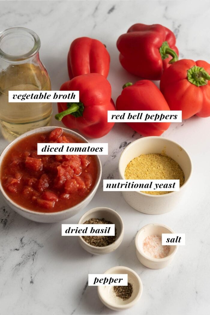 Visual list of ingredients for making a roasted red pepper tomato soup recipe. Each ingredient is labelled with text overlay.