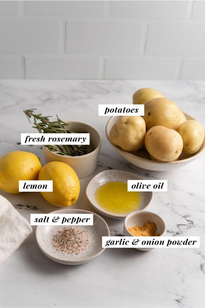 Visual list of ingredients for making rosemary lemon roasted potatoes. Each ingredient is labelled with text describing what it is.