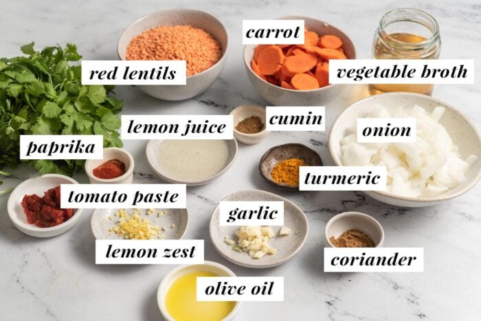 Visual list of ingredients for making a lemon red lentil soup recipe.