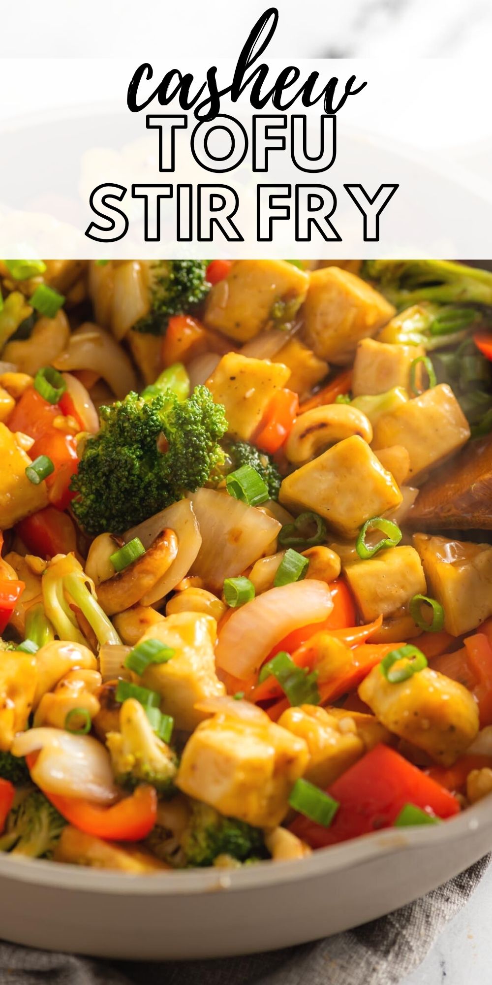 Pinterest graphic with an image and text for a cashew tofu stir fry recipe.