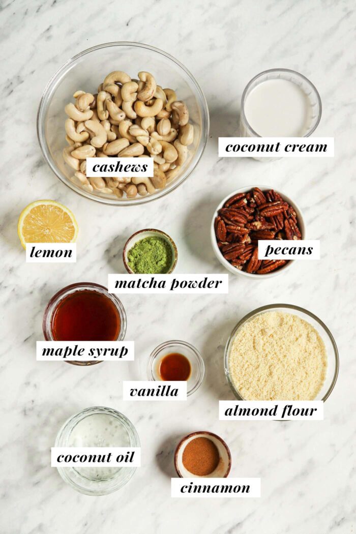 Visual list of ingredients needed for making a no-bake vegan matcha cheesecake recipe. Each ingredient is labelled with text.