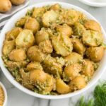 Bowl of tangy dill and dijon potato salad made without mayonnaise.