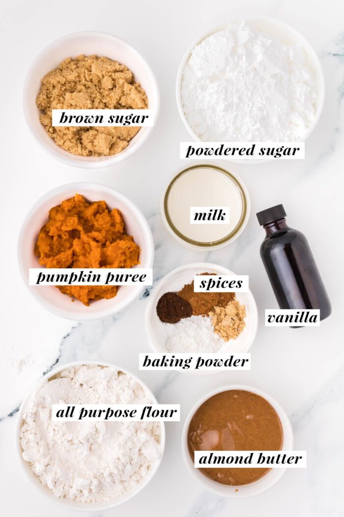 All the ingredients needed for making a vegan soft pumpkin cookie recipe. Each ingredient is labelled with text describing the ingredient and the list can be found in the corresponding blog post.