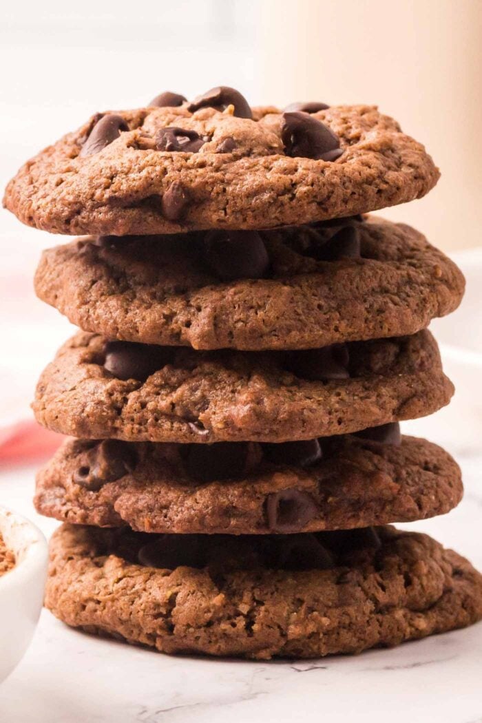 A stack of 5 double chocolate cookies.