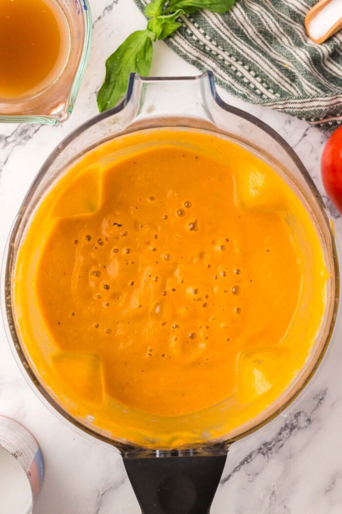Creamy roasted tomato soup in a Vitamix blender.