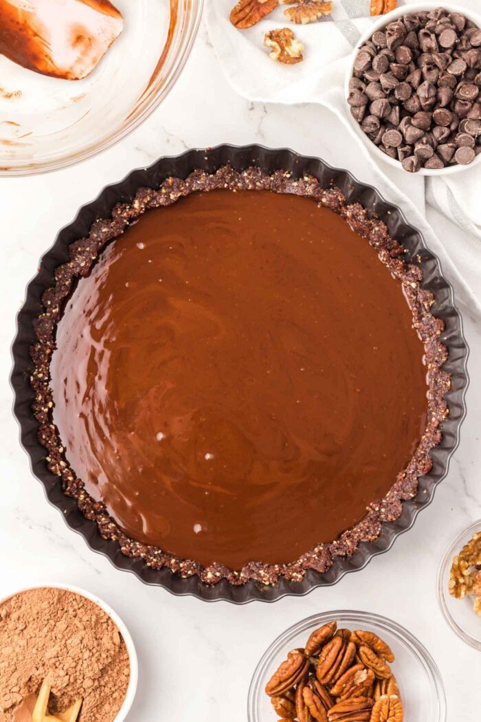 A chocolate ganache tart before it cools and sets.