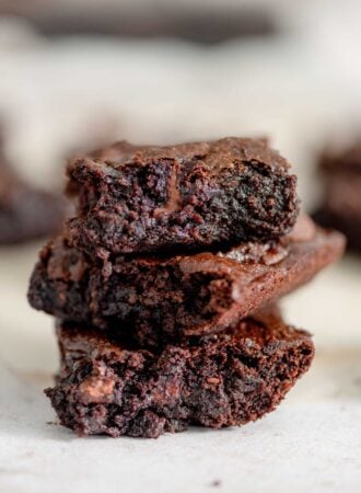 A stack of 3 chocolate chip brownies.