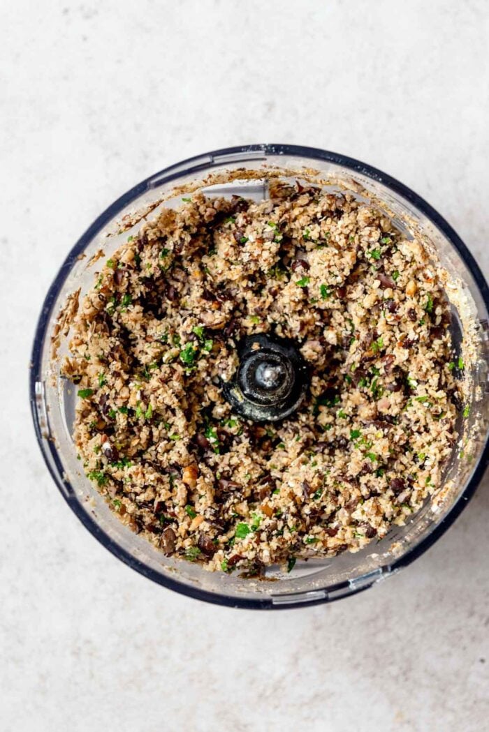 Blended oats, walnuts, black beans and cilantro in food proccessor.