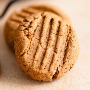 Peanut butter cookie with fork marks on top.