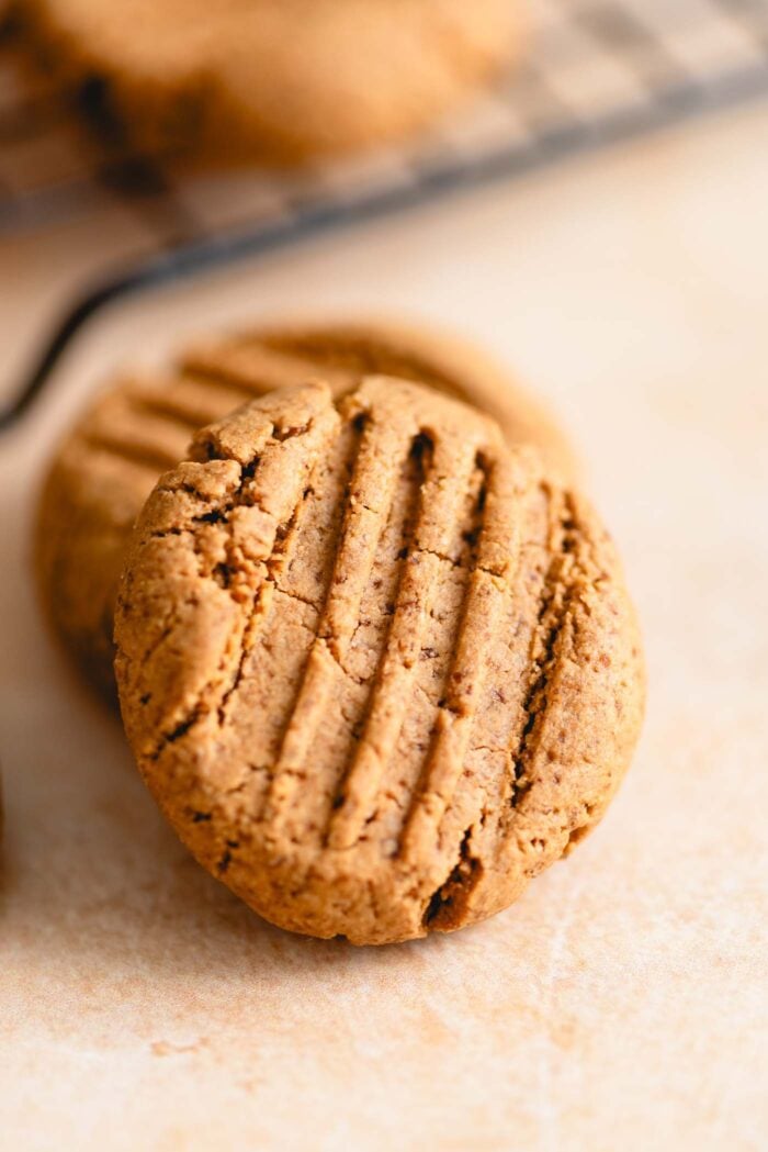 Peanut butter cookie with fork marks on top.