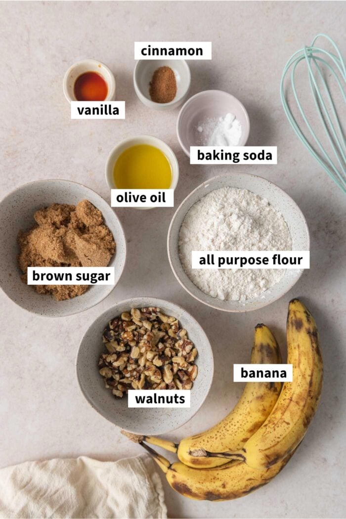 Gathered ingredients for making an eggless banana muffin recipe with walnuts, brown sugar and cinnamon.