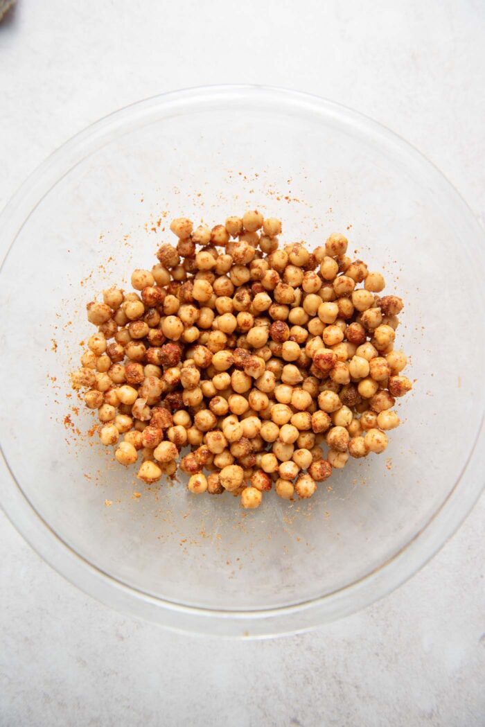 Bowl of chickpeas mixed with spices.